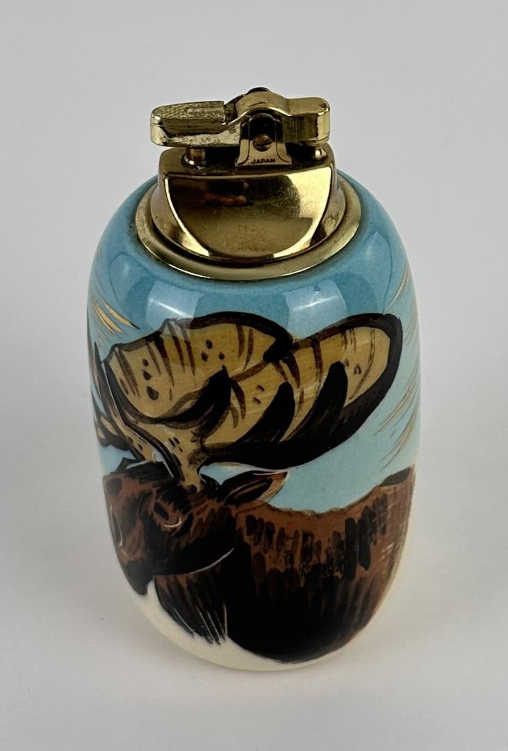 Matthew Adams Mid Century Alaska Moose Lighter: Measures 5 1/2" tall by 3" in diameter.