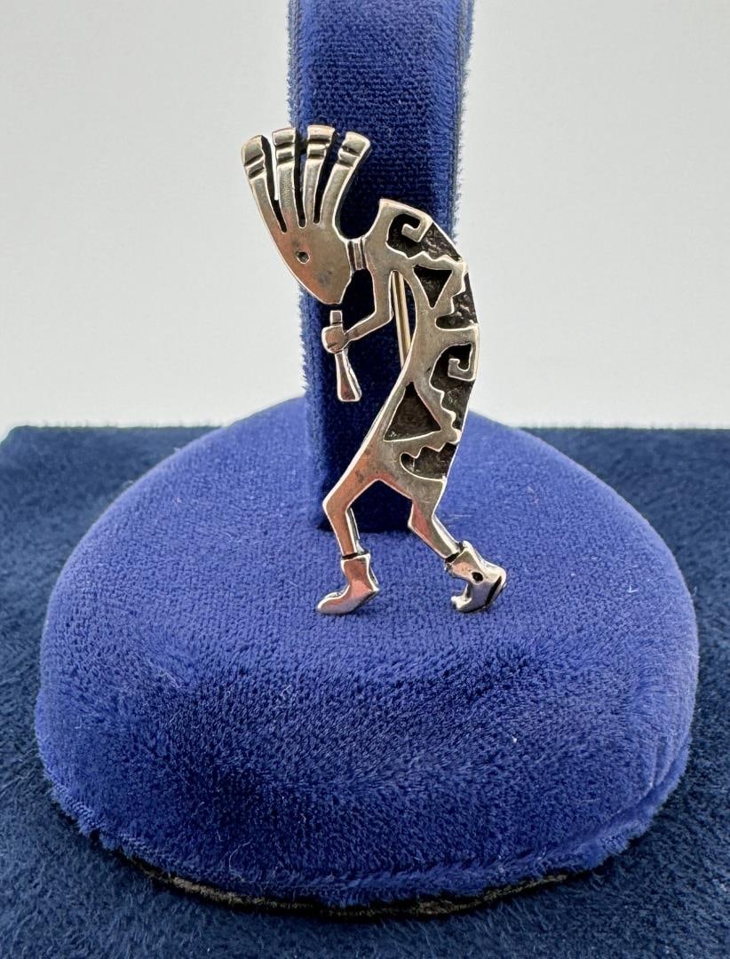 Sterling Silver Kokopelli Brooch: 1 1/2" by 1/2"