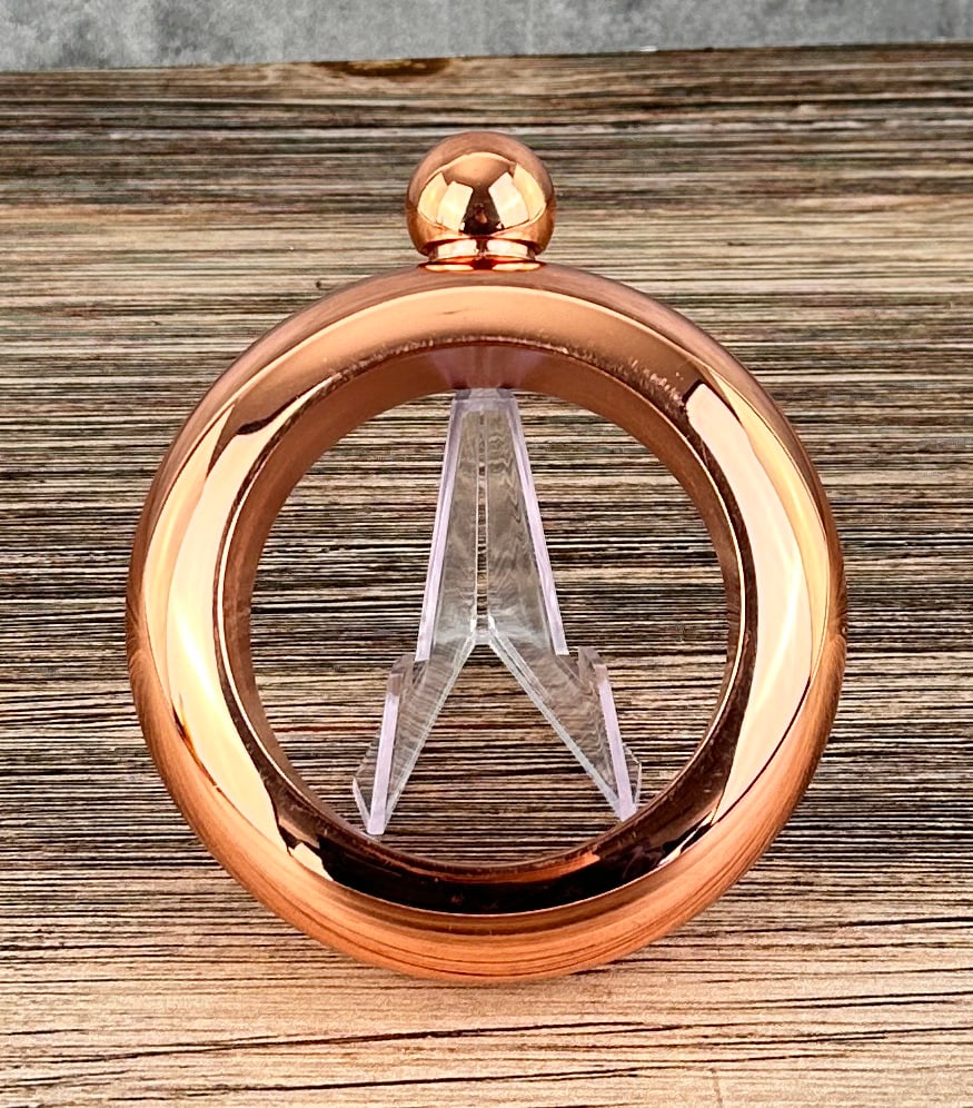Copper Tone Bracelet Flask: 3 3/4" outside diameter by 1 1/2" thick