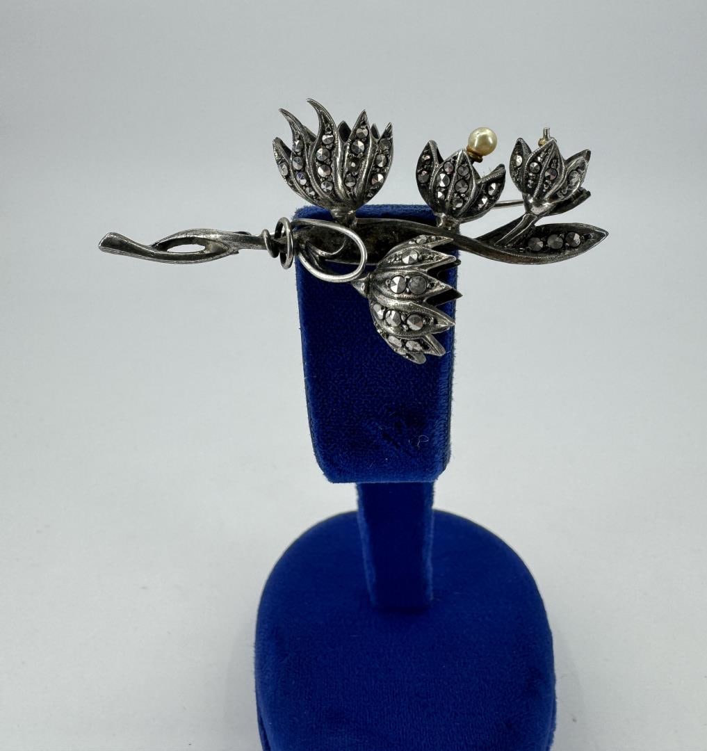 Sterling Silver Marcasite Flower Brooch: 2 1/4" by 1". One pearl is missing.
