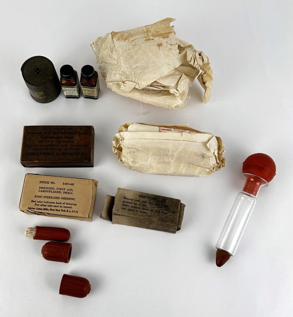WW2 and Vietnam War First Aid Kits: Nice grouping.