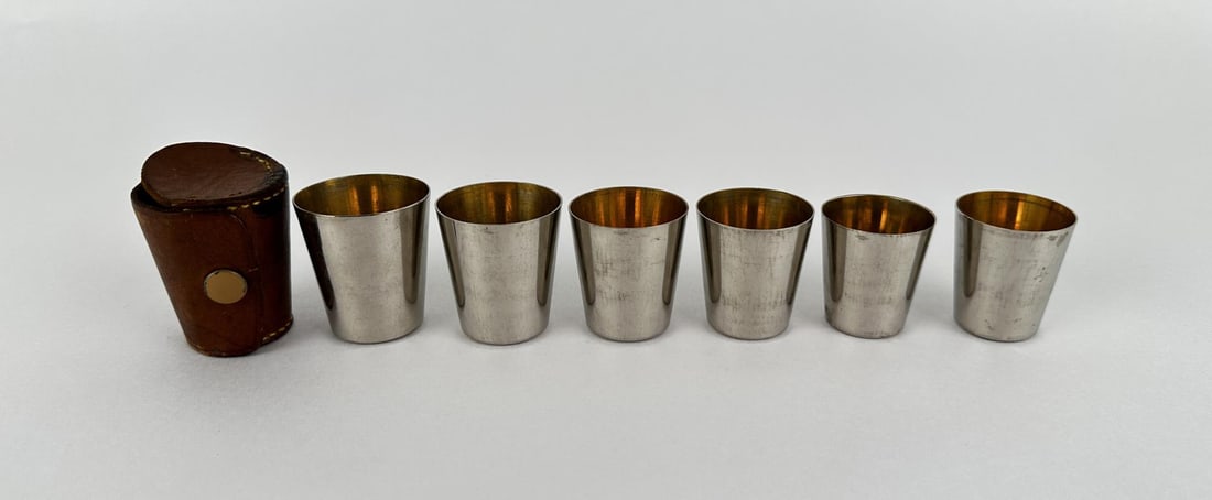 Nesting Metal Shot Glass Travel Set: Six cups plus case.