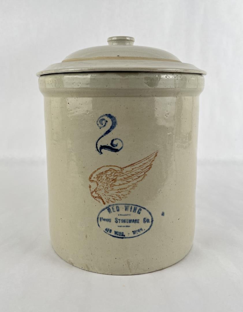 Red Wing Union Stoneware 2 Gallon Crock: Includes button handle lid. 12 1/4" tall by 10" in diameter.