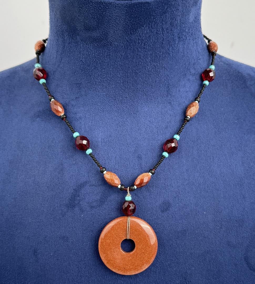 Goldstone Donut Necklace: 15 3/8" long.