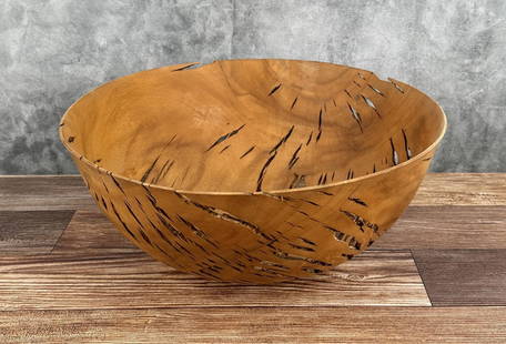 Michael Lee Hawaii Carved Camphor Wood Bowl: 15 1/2" by 15" by 6 7/8" tall. Mike Lee is Hawaii born and raised, and it shows. An avid surfer and waterman, he gets a lot of the inspiration for his wood carving from the ocean. An excellent and pat