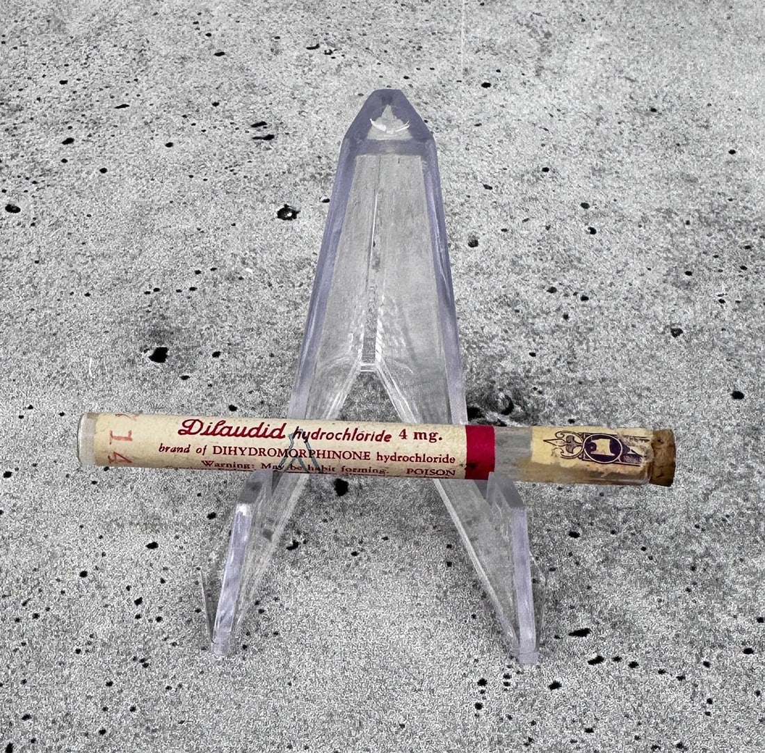 Knoll Dilaudid Hydrochloride Pharmacy Bottle: Bottle is empty. Hubbard's Pharmacy Polson Montana Estate. 2 5/8" long. Knoll Pharmaceutical.