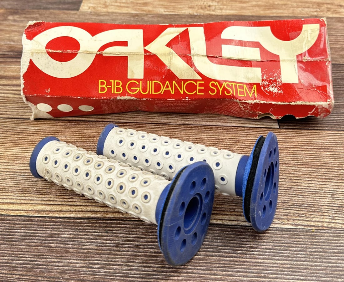 Vintage Oakley B-1B BMX Grips: Nice set in original box.