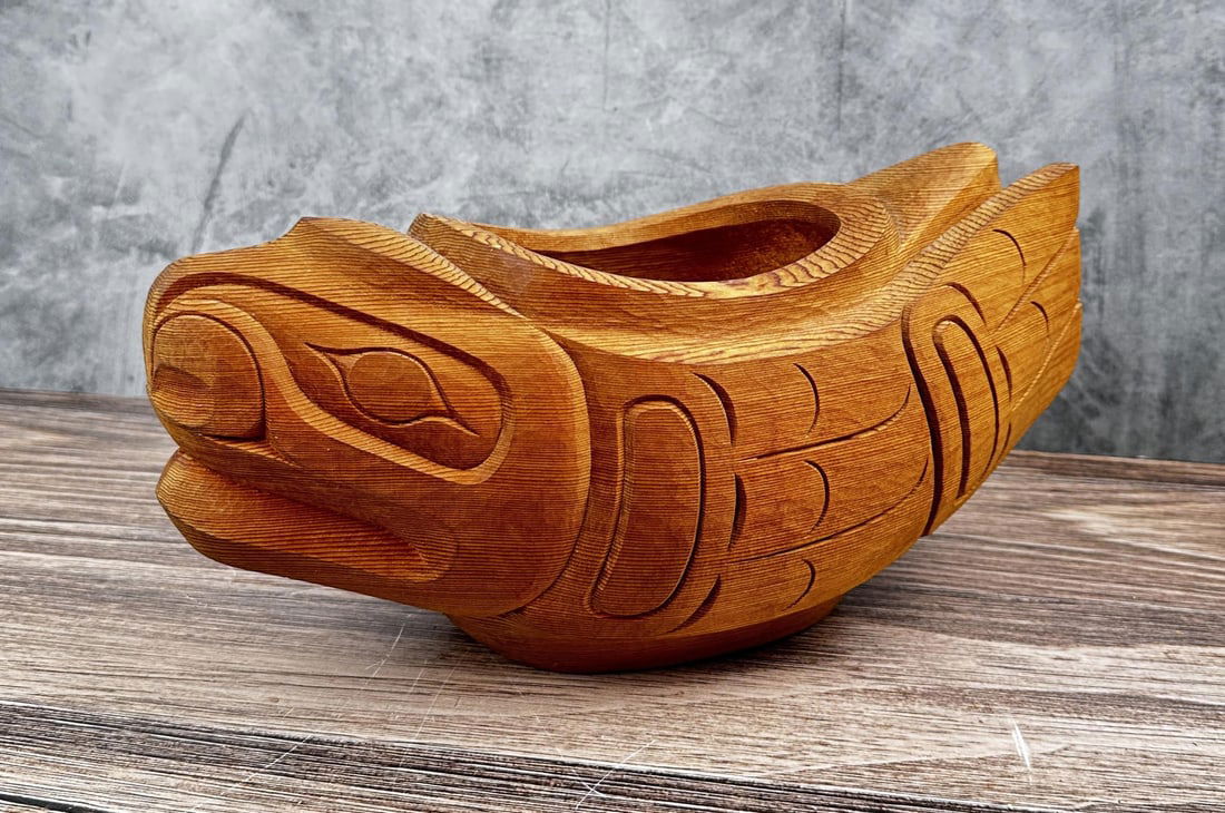 Tony Hunt Jr Kwakiutl Northwest Coast Indian Bowl: Potlatch or Grease Bowl. Waxed finish. 14 1/2" by 7 3/4" by 7". Tony Hunt, Jr. (1961 - 2017) was active/lived in British Columbia / Canada. Tony Hunt Jr is known for Wood carving, waterfowl. Tony Hunt