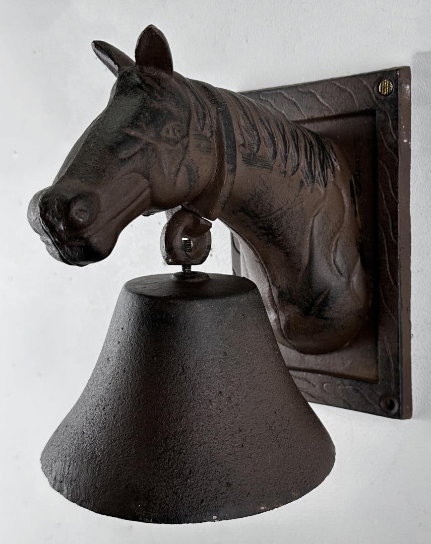 Cast Iron Horse Head Bell: 8 1/4" tall by 5" wide by 7 1/2" out from the wall. No clanger.