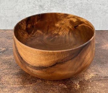 Michael Lee Hawaii Carved Koa Wood Bowl: 5" tall, 9 3/4" diameter. Mike Lee is Hawaii born and raised, and it shows. An avid surfer and waterman, he gets a lot of the inspiration for his wood carving from the ocean. An excellent and patient