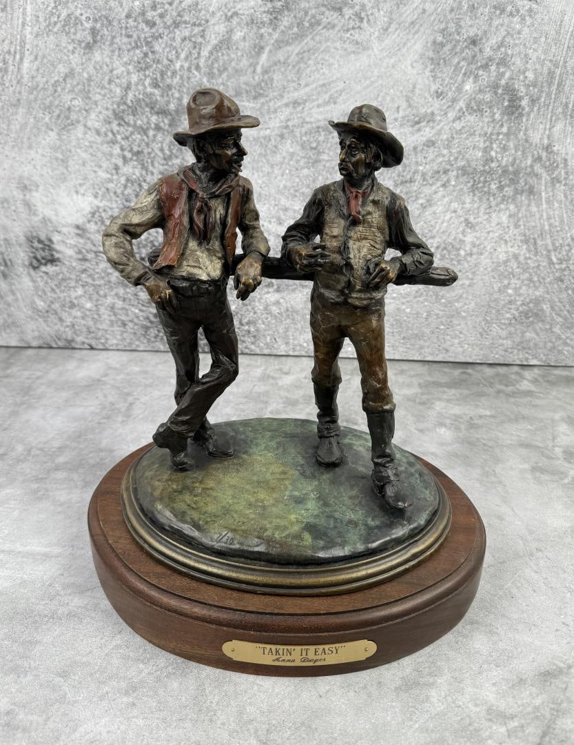 Anna Dwyer Cowboy Bronze Takin it Easy: Title is Takin it Easy. 12 1/8" by 11" by 8 1/4". Anna Dwyer (20th century) was active/lived in Montana. Anna Dwyer is known for Horses, children, sculptor.