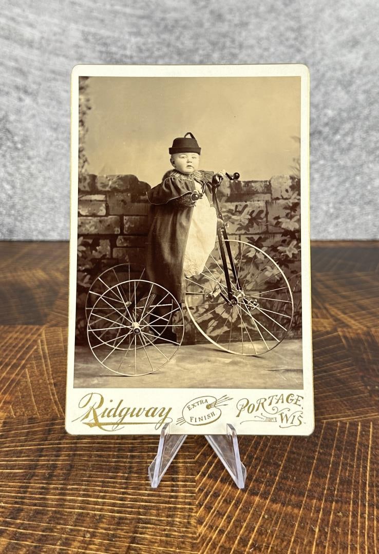 Portage Wisconsin Baby on Tricycle Photo: Identified. 4 1/4" by 6 1/2".