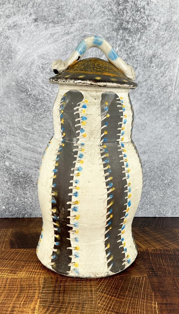 Kurt Weiser Montana Studio Pottery Lidded Jar: 16 1/2" tall, 8 1/4" diameter. Chip on rim of lid. Note inside claims that it was obtained from Weiser during his 1968-1972 education at Kansas City Art Institute. Kurt Weiser (Born 1950) is active/li