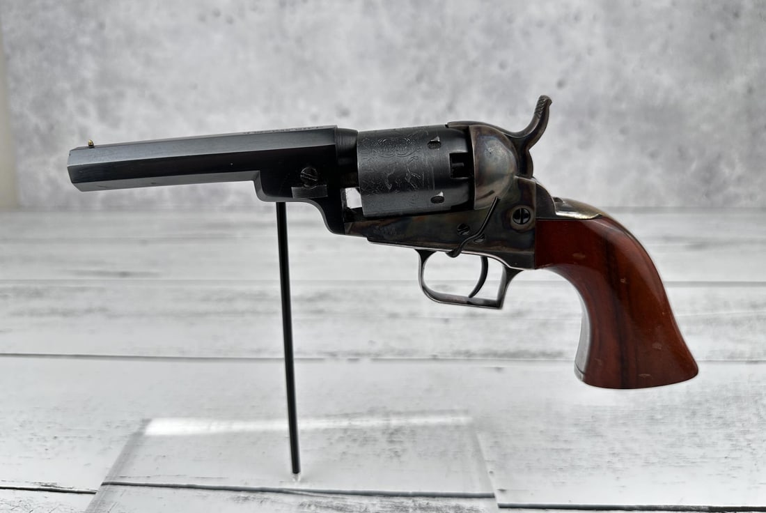 Colt 2nd Generation 1849 Baby Dragoon Revolver: Cal. 36. S# 16708. Bbl. 4". Second Generation Baby Dragoon mfg. by Colt. Top of bbl. is marked with Colt's New York address, with the left side of the frame being marked "COLTS/ PATENT. Cyl. (with ova