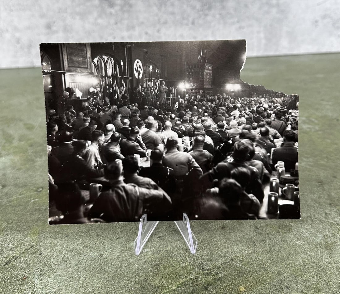Hitler At Remembrance Of Beer Hall Putsch Photo: Frederic Lewis press photo. 6 1/2" by 4 3/4". Corner missing as shown.