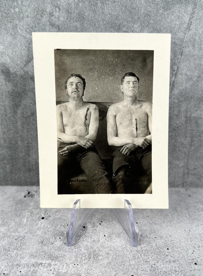 James Younger Gang Members Death Photo: 3 3/4" by 2 3/4". Image of Clel Miller and Bill Stiles after being killed during the attempted bank robbery in Northfield, Minnesota. Back stamped Sumner Studios Northfield, Minn.