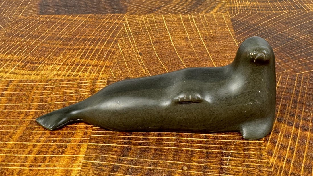 Alaskan Inuit Eskimo Soapstone Seal Carving: 5 1/4" long by 1 1/4" wide by 2" high.