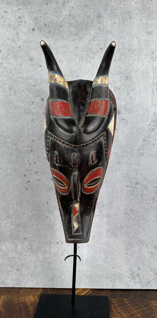 Guro Ivory Coast African Zamale Antelope Mask: 6" by 15 3/4" by 4 1/2". Provenance: The Estate of Sherwin Scott.