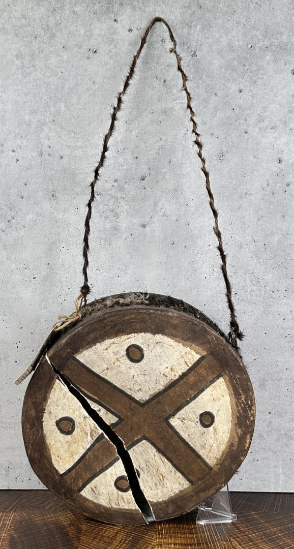 Kenya Africa Painted Drum: Drum cover is split on one side. 11 1/4" diameter. Provenance: The Estate of Sherwin Scott.