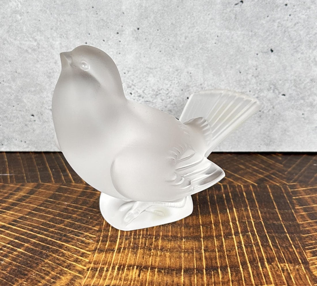 French Lalique Crystal Sparrow: 4 1/8" by 3 1/4" by 2 1/4". Provenance: The Estate of Sherwin Scott.
