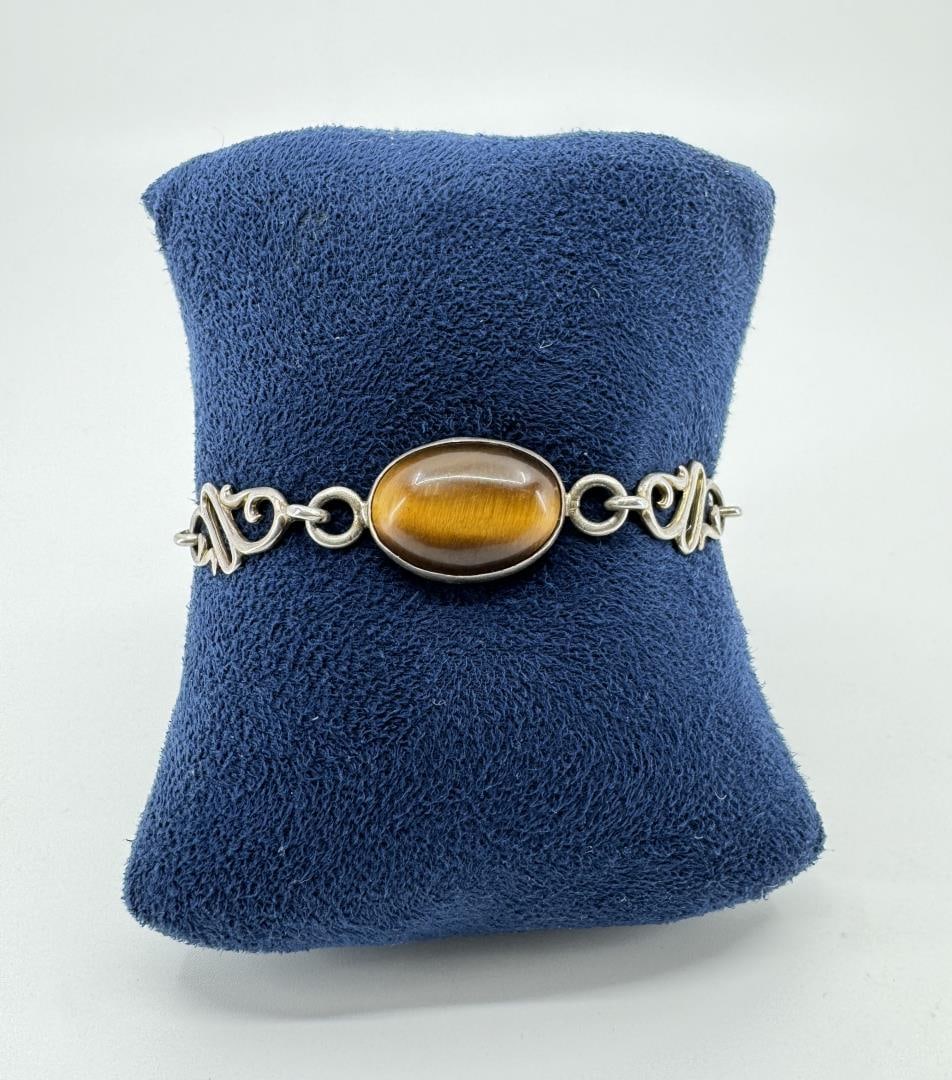 Sterling Silver Tigers Eye Bracelet: 6 3/4" long.