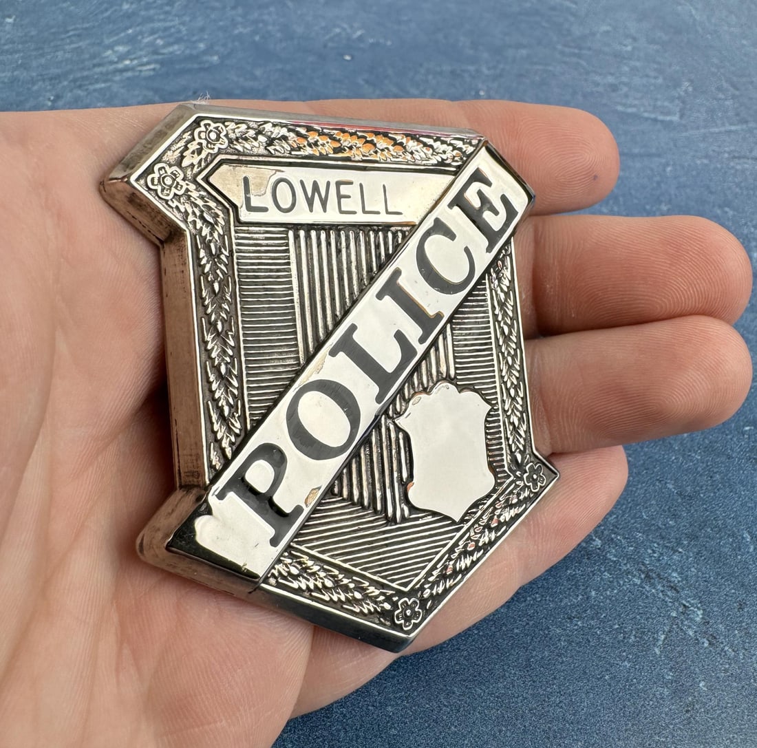 Antique Lowell Massachusetts Police Badge: 2 3/4" by 2 1/2". Pin is missing.