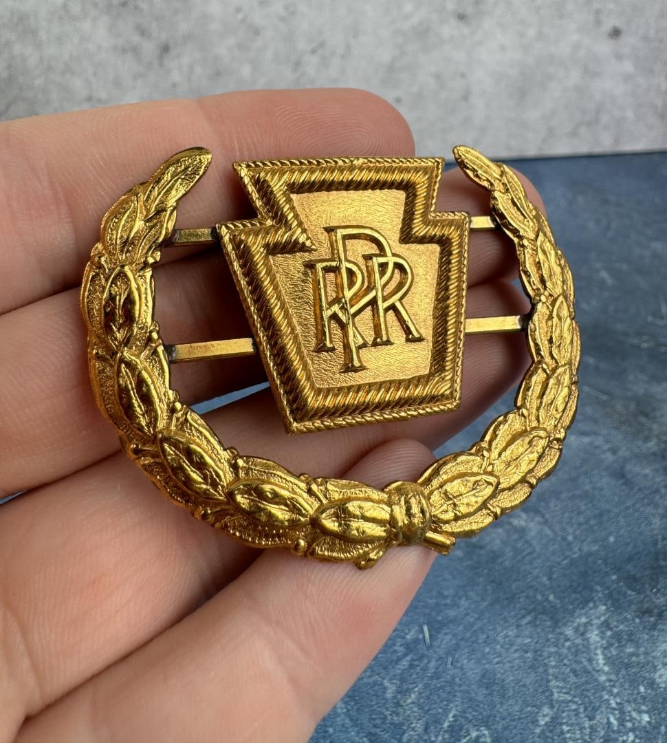 Pennsylvania Railroad Hat Badge: 2 1/2" by 1 3/4".