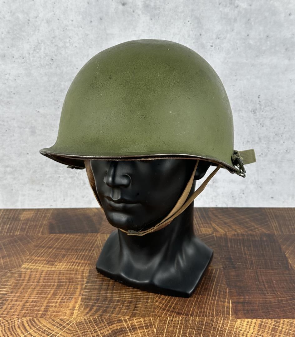 Korean Vietnam War Rear Seam M1 US Army Helmet: 1952 dated liner.