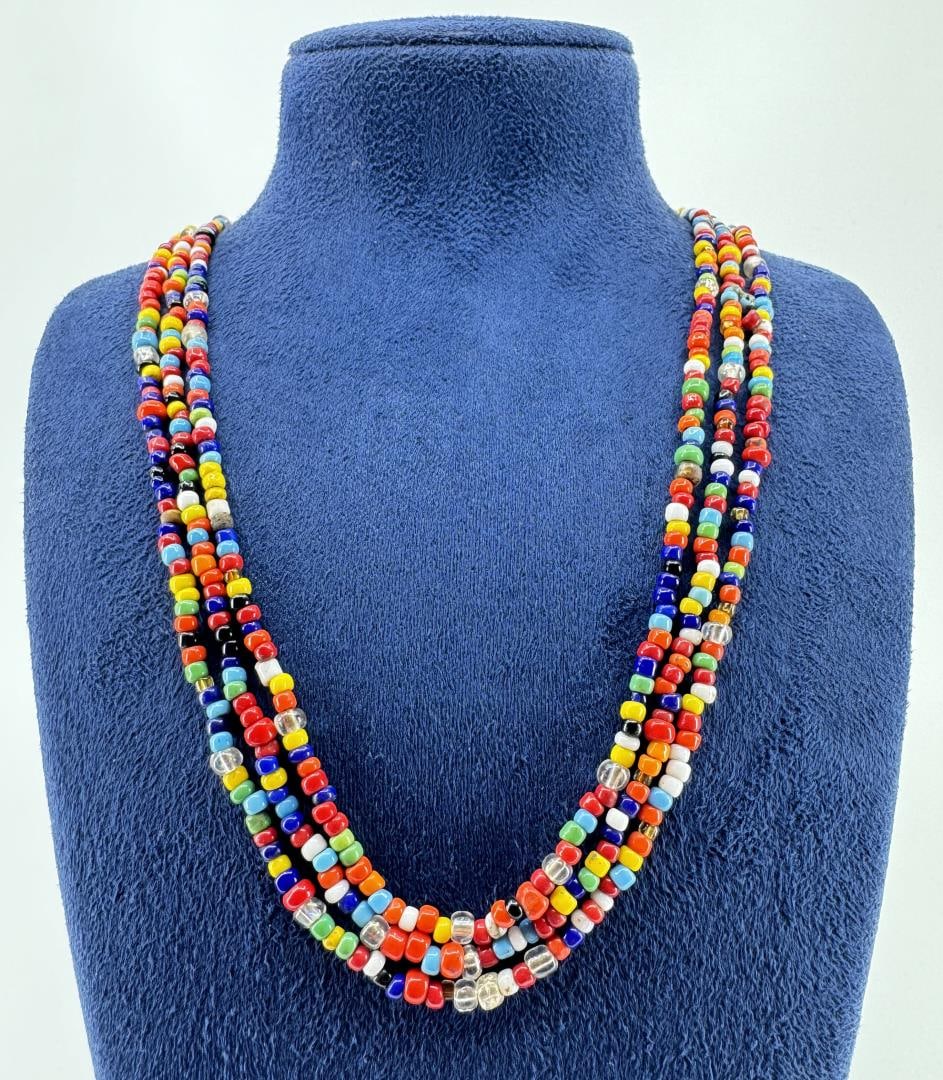 Antique Native American Indian Trade Beads: Three strands. 11 3/4" long.