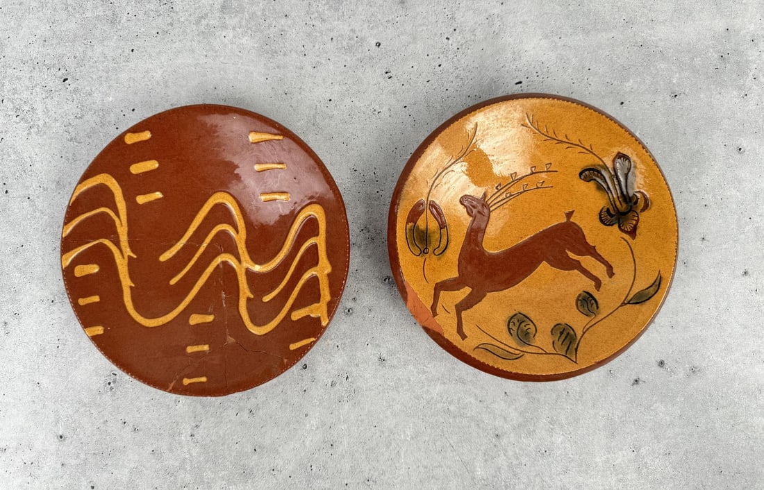 Turtle Creek Potters Redware Plates: 6 1/2" in diameter. Both are damaged.