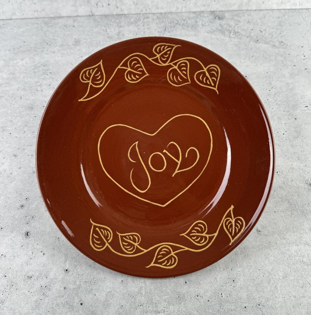 Swinging Bridge Pottery Redware Plate: 9 1/4" in diameter.