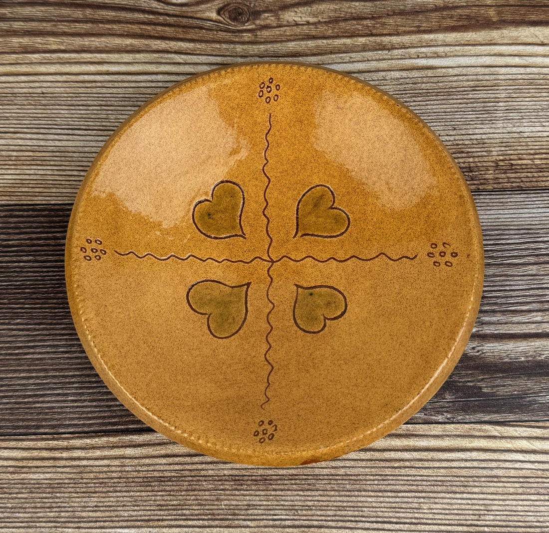 Turtle Creek Potters Slip Decorated Redware Plate: 6 1/2" in diameter.