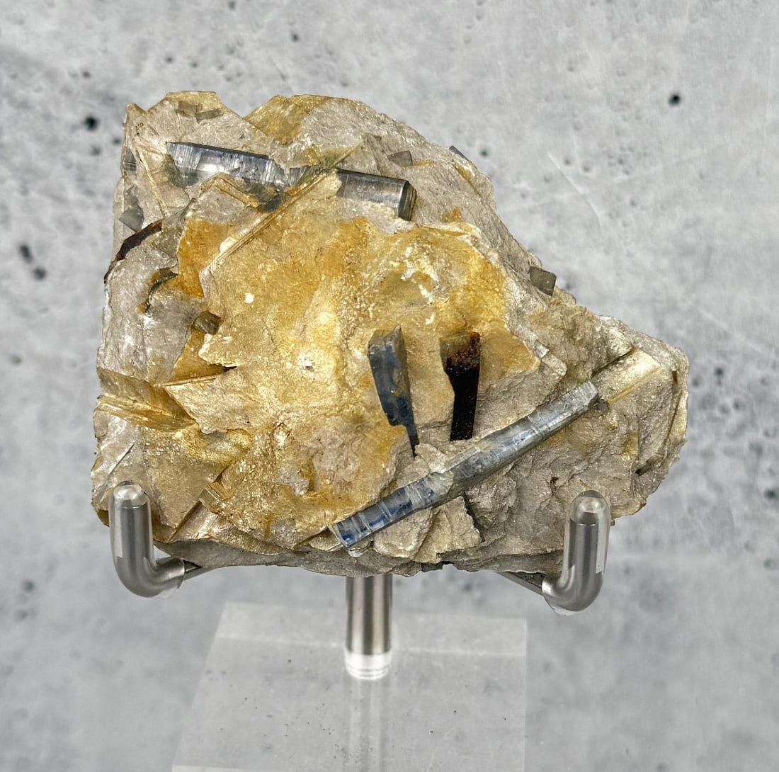 Kyanite Sponda Alp-Pizzo Forno Specimen: Sponda Alp-Pizzo Forno Switzerland. 2 5/8" by 2 1/8" by 7/8". 76.55 grams. Provenance: From the Estate of Kitty's Copper Shop Butte Montana.