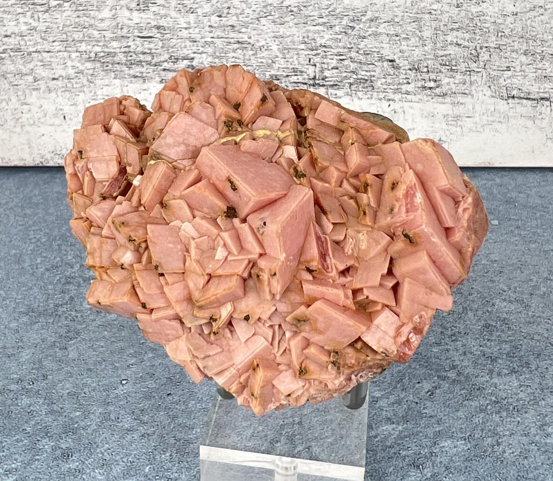 Rhodochrosite with Pyrite Butte Montana Specimen: Absolute stunner, Museum Grade. Emma Mine Butte Montana. 367 grams. 3 1/2" by 2 3/4" by 1 3/4". Provenance: From the Estate of Kitty's Copper Shop Butte Montana.