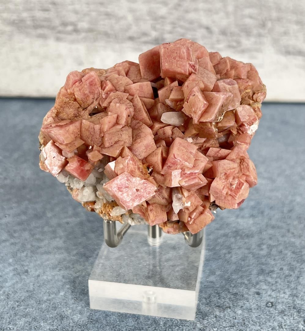 Rhodochrosite with Pyrite Butte Montana Specimen: Emma Mine Butte Montana. 233 grams. 2 3/4" by 2 5/8" by 1 5/8". Provenance: From the Estate of Kitty's Copper Shop Butte Montana.