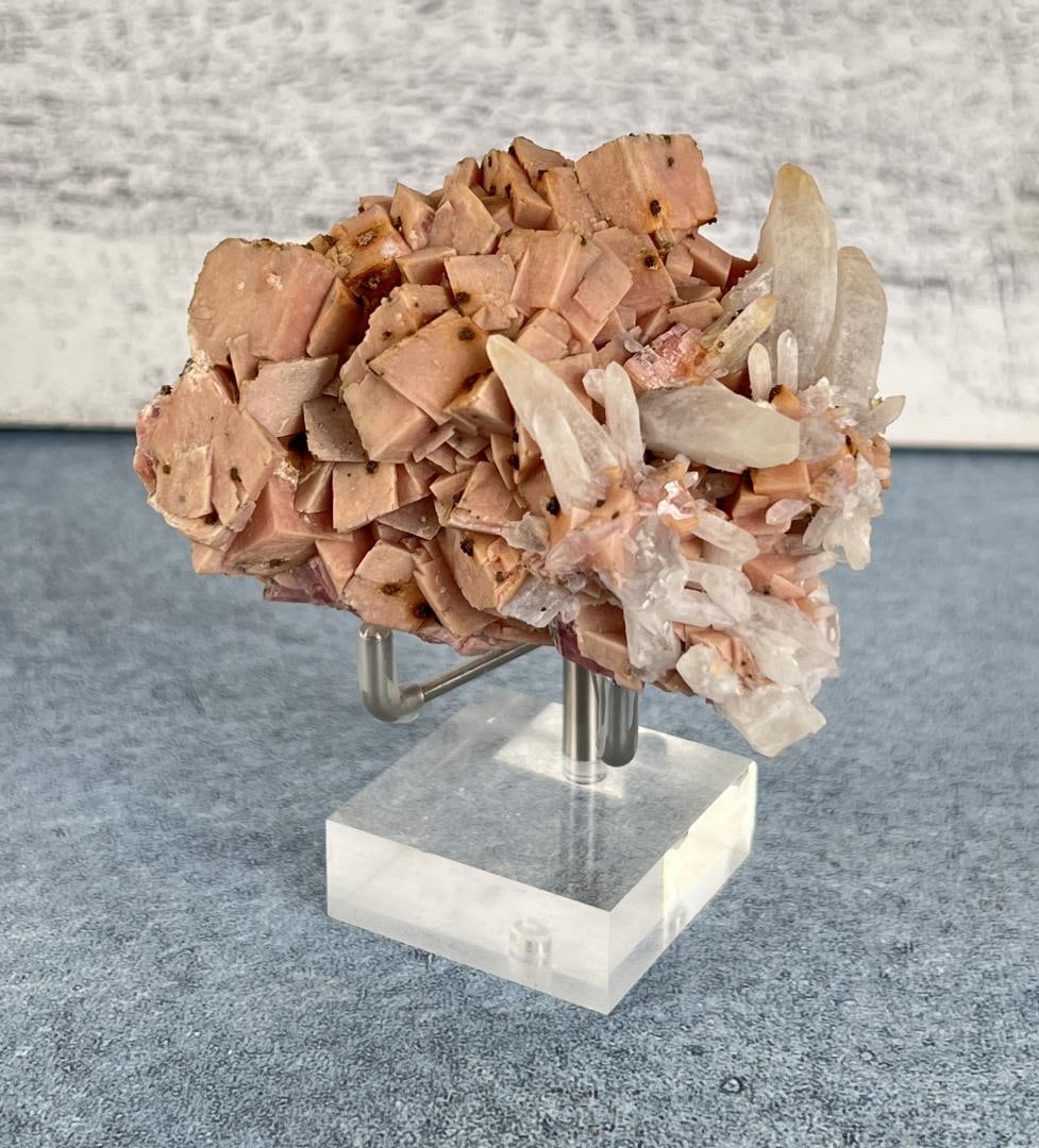 Rhodochrosite with Pyrite Butte Montana Specimen: Emma Mine Butte Montana. 271 grams. 3 1/4" by 2 1/2" by 1 5/8". Provenance: From the Estate of Kitty's Copper Shop Butte Montana.