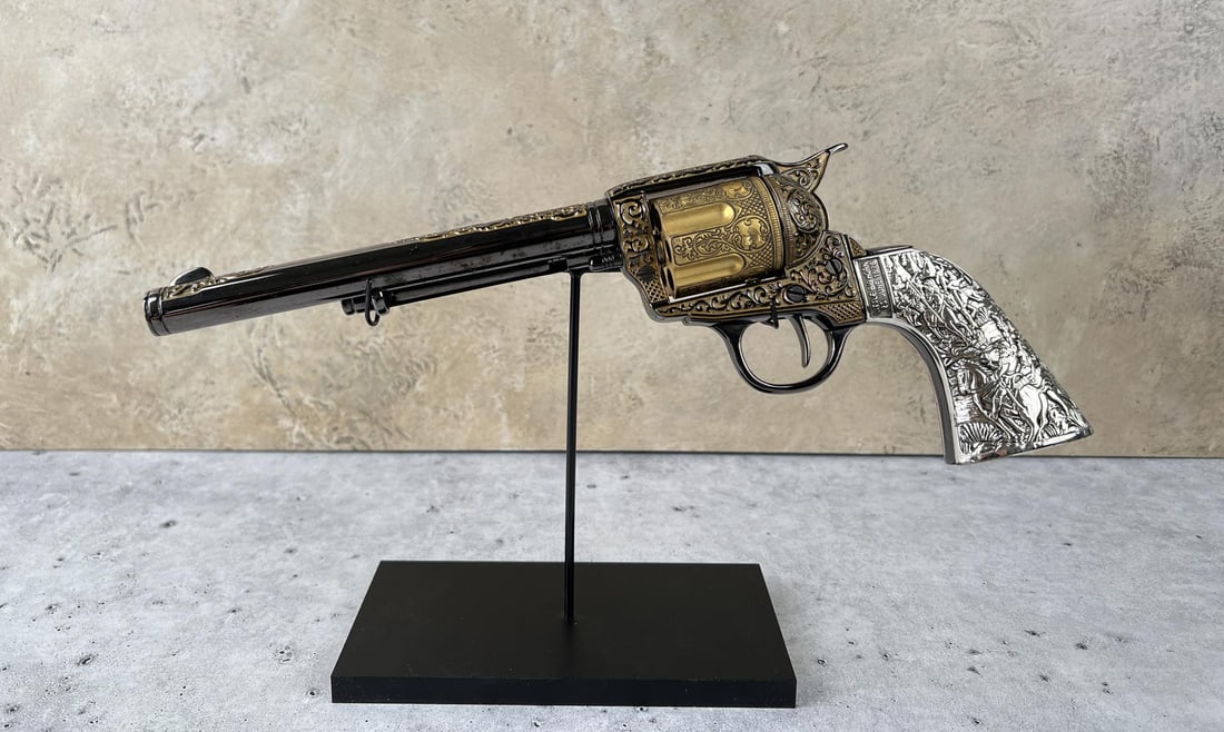 Little Big Horn Revolver Engraved Replica: Non firing Colt Model 1873 long barrel replica / display. 7" overall length. US Sales only. A bid from any of these restricted areas will result in immediate termination of your agility to place bids 