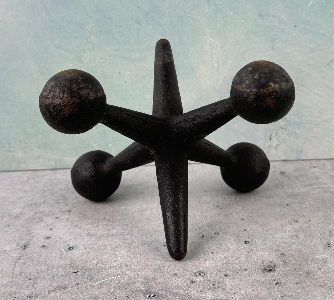 Mid Century Cast Iron Jack Bookend: 4 1/4" diameter.