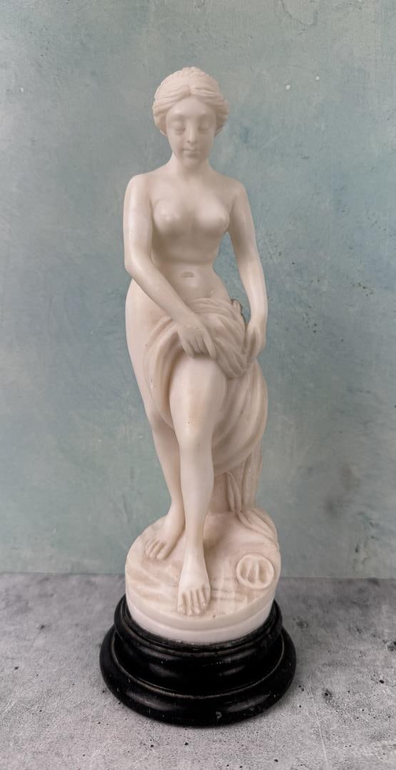 Venus at Her Bath Alabaster Sculpture: 10 1/4" tall, 3 1/2" diameter.