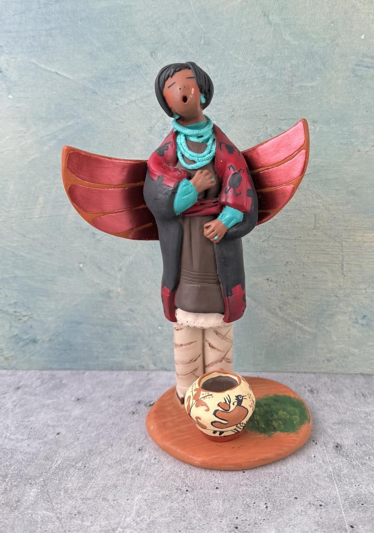 April Romo De Vivar Clay Statue: 7 1/8" by 4 1/2" by 3 1/4"