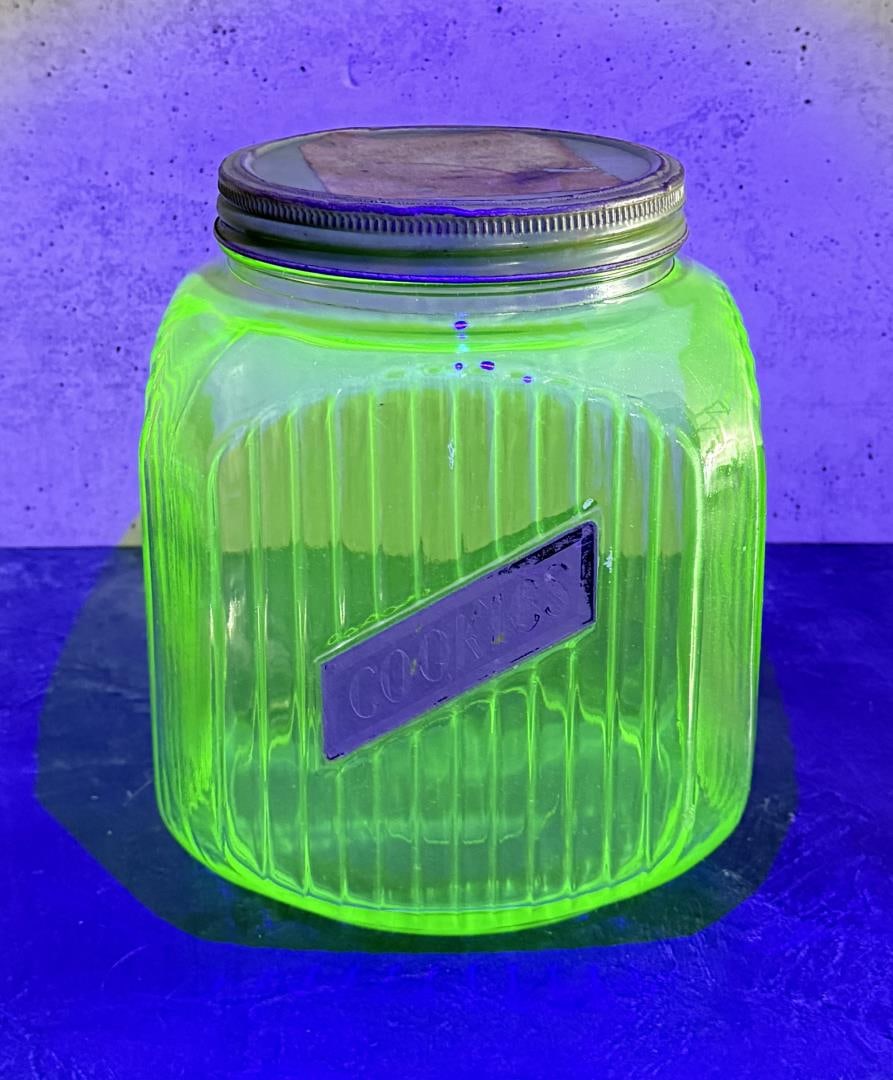 Uranium Vaseline Glass Hoosier Cookie Jar: 8" tall, 6 1/2" diameter.