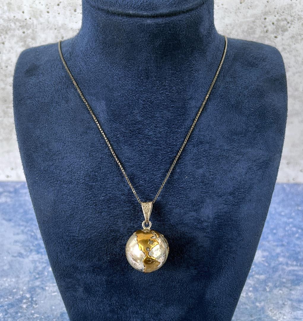 Taxco Sterling Silver Globe Chime Necklace: 19.1 grams. 16" long.