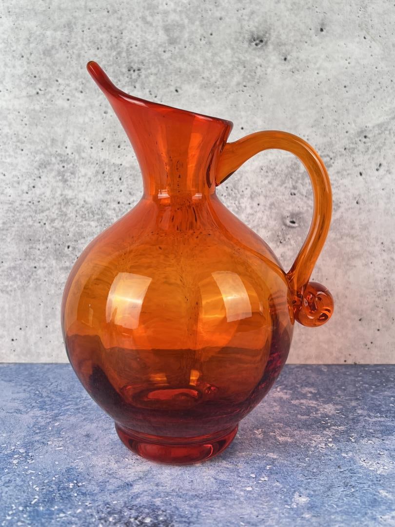 Blenko Glass Tangerine Wayne Husted Pitcher: 7 3/4" tall by 4 3/4" in diameter.