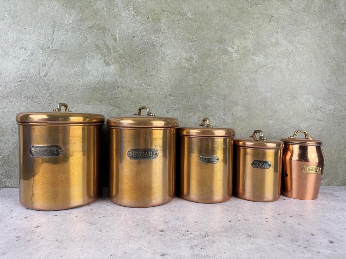 Copper Kitchen Canister Set: Five pieces total. The garlic canister is a slightly different design.