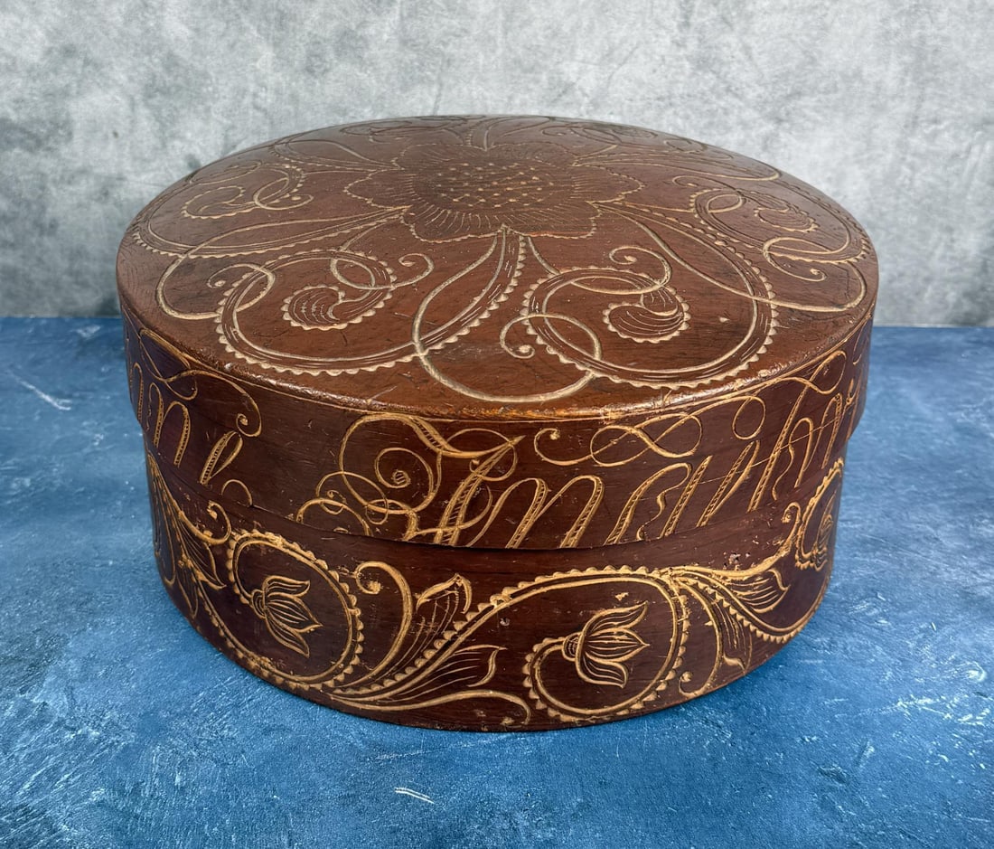 1827 John H Budalsplads Norway Carved Wooden Box: 5 3/4" high by 11 1/4" in diameter. John Hansen Budalsplads 1798-1874, a craftsman from Budalen, a remote mountain valley in central Norway, is well known for his production of ornamented, wooden boxe