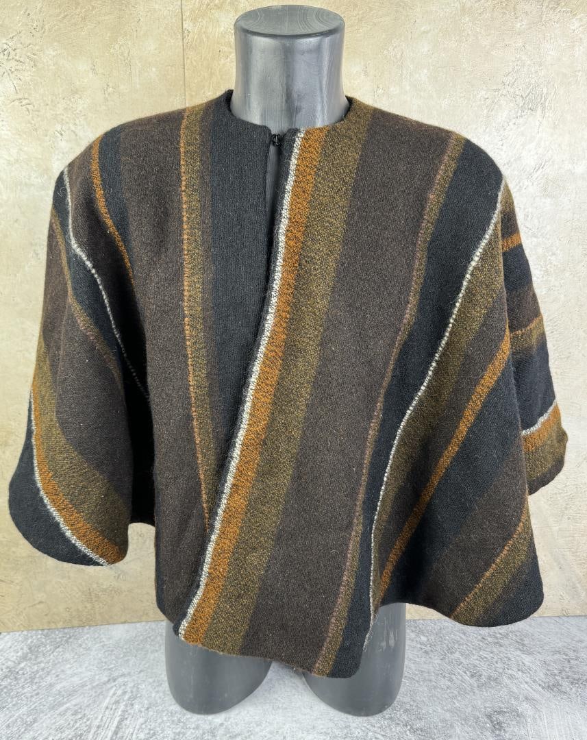 Alice Kagawa Parrott Santa Fe Wool Robe Poncho: 25" long. Alice Kagawa Parrott (February 12, 1929 ? September 11, 2009) was a Japanese American fiber artist and ceramicist. She spent most of her adult life in Santa Fe, New Mexico, where she establi