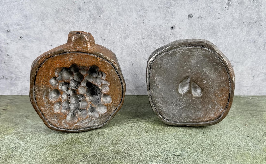 Cast Iron Pomegranate Bookends: 3 1/2" tall.