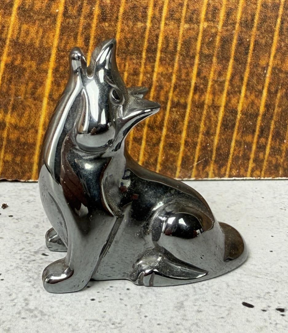 Carved Hematite Howling Wolf Figurine: 1 1/2" tall, 1 1/2" long, 3/4" wide.