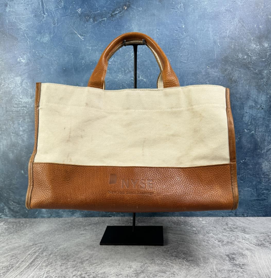 Vintage New York Stock Exchange Tote Bag: Leather and Canvas. Measures 16" by 10" tall.