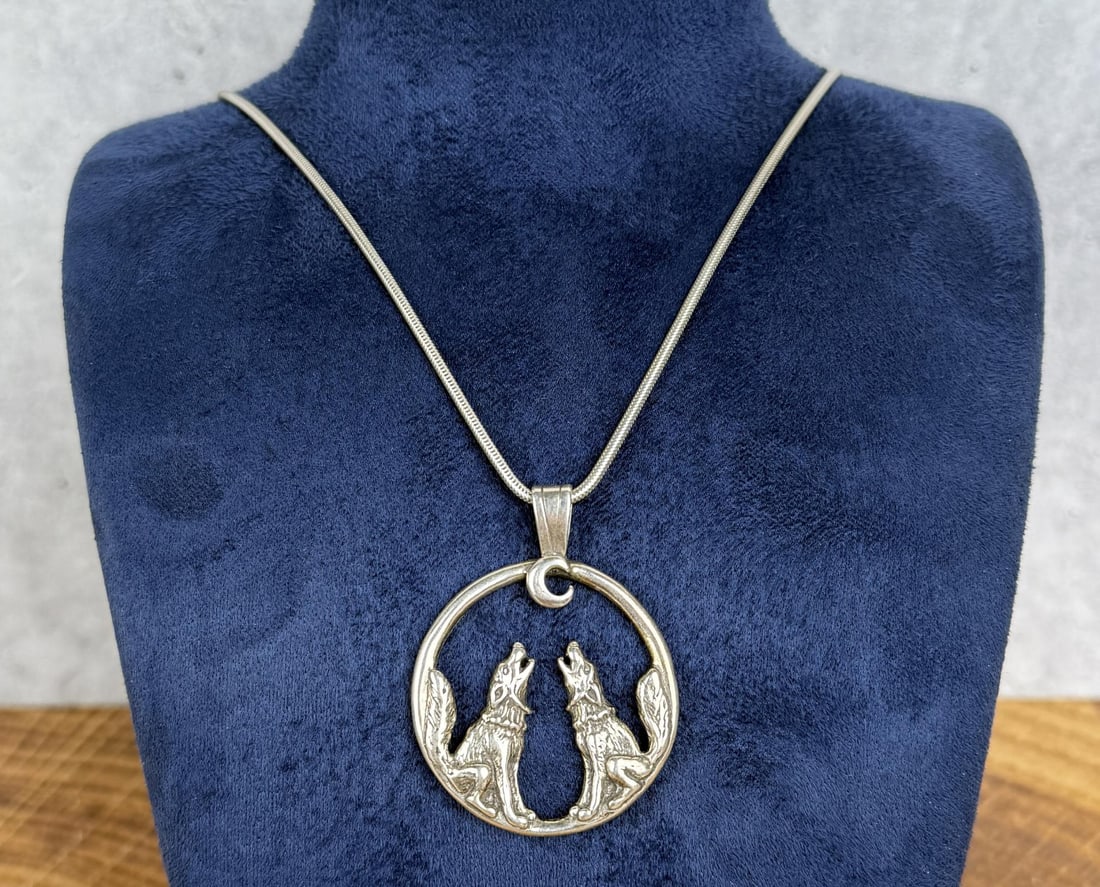 Sterling Silver Southwestern Coyote Necklace: 11 3/8" long, pendant is 1 1/4" in diameter. 16.74 grams.